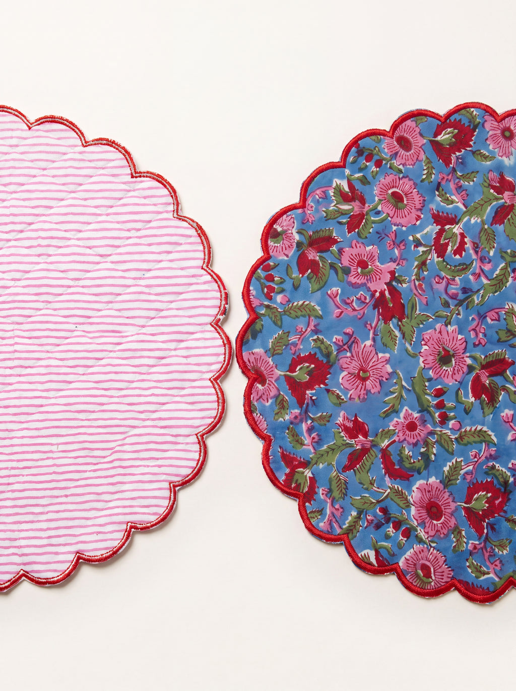 Berry Meadow cotton placemat shown with floral front and striped reverse