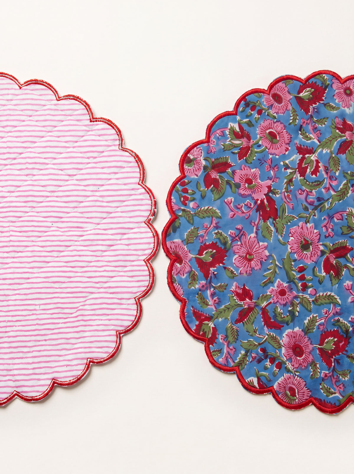 Berry Meadow cotton placemat shown with floral front and striped reverse