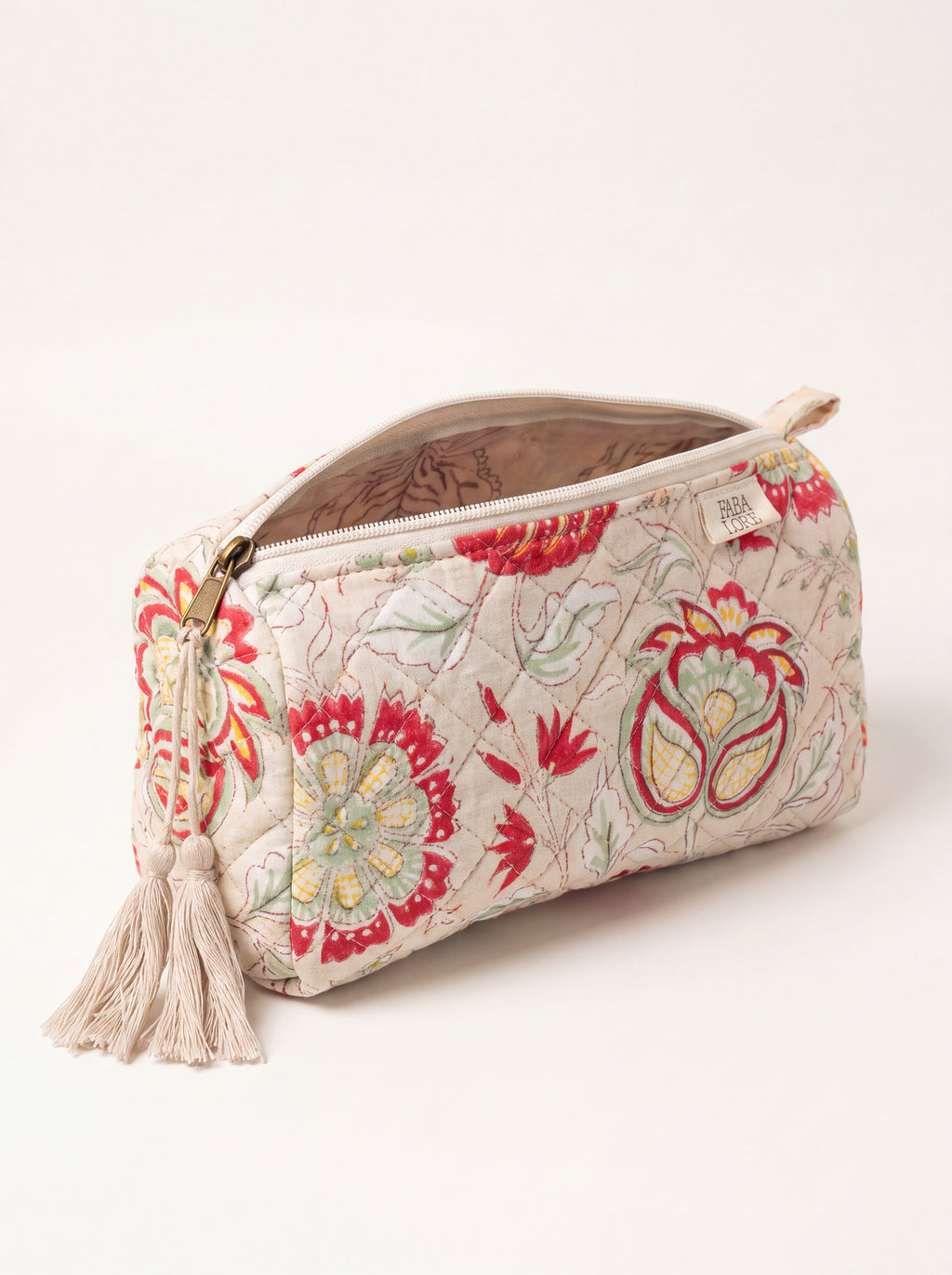 Open Fabalore Meadow quilted floral pouch showing zip closure and lined interior.