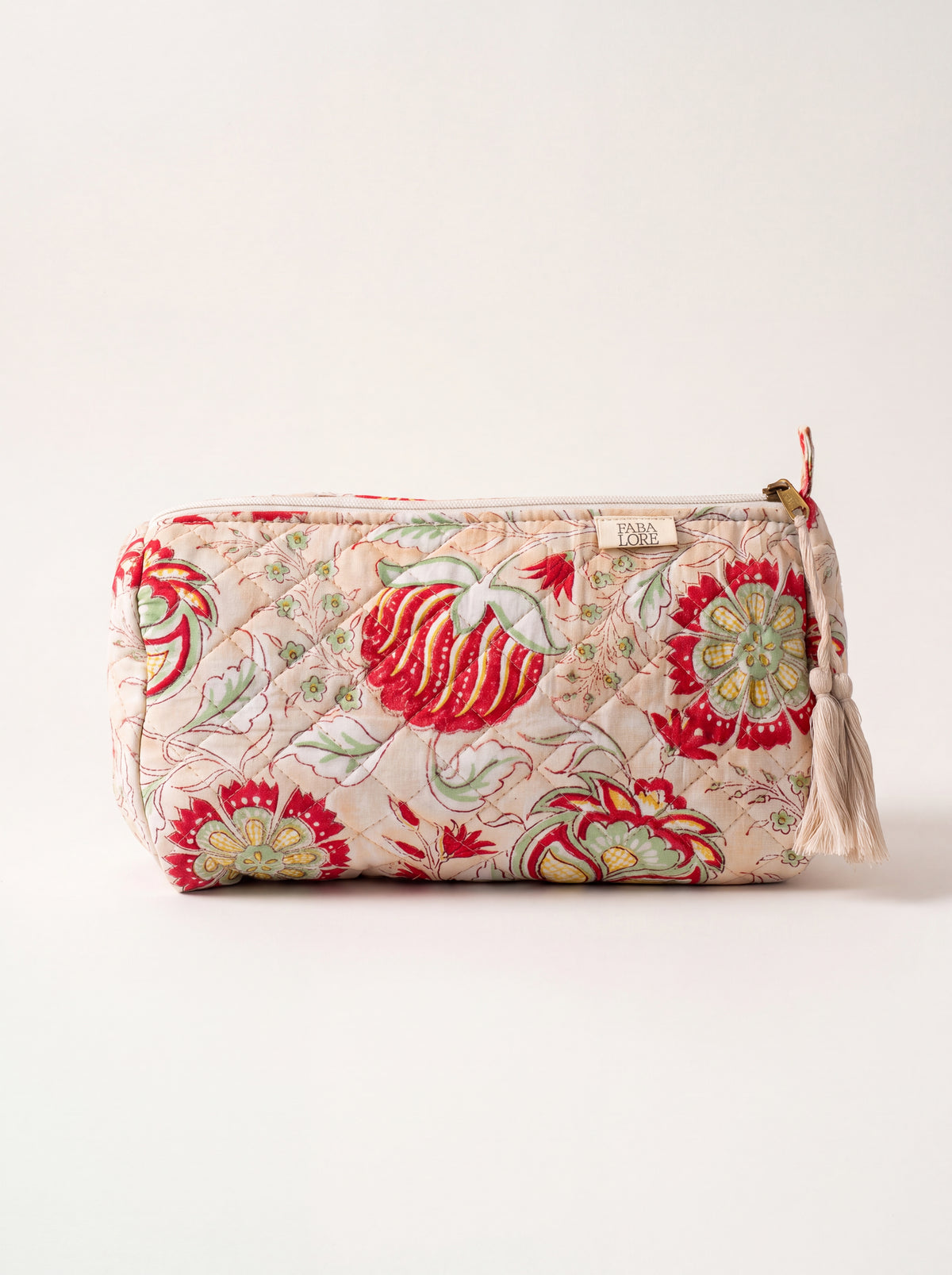 Large Fabalore Meadow quilted floral pouch with cream zipper and tassel.
