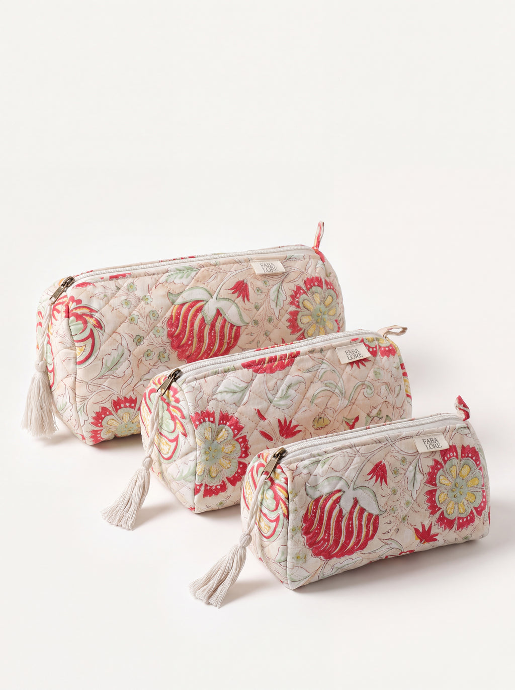 Three Fabalore Meadow quilted floral pouches in small, medium and large sizes.