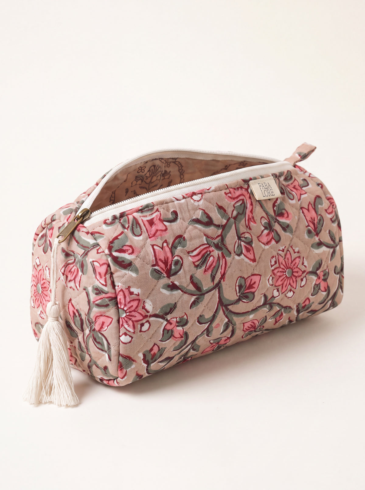 Open Fabalore Rosewood quilted floral pouch showing zip closure and lined interior.