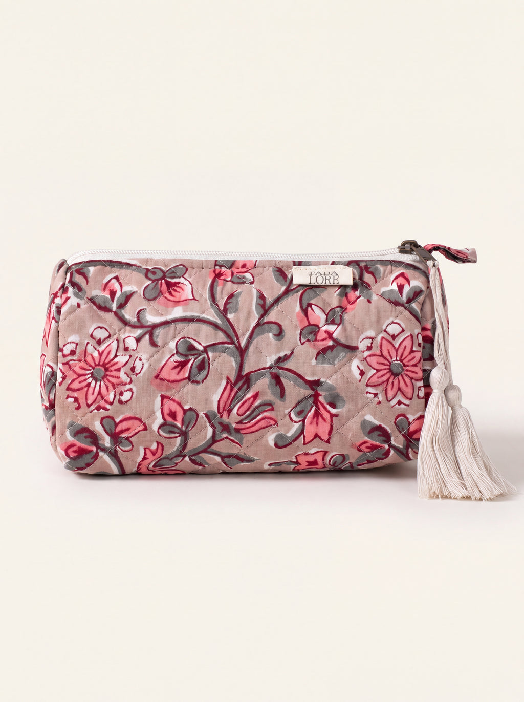 Small Fabalore Rosewood quilted floral pouch with cream zipper and tassels.