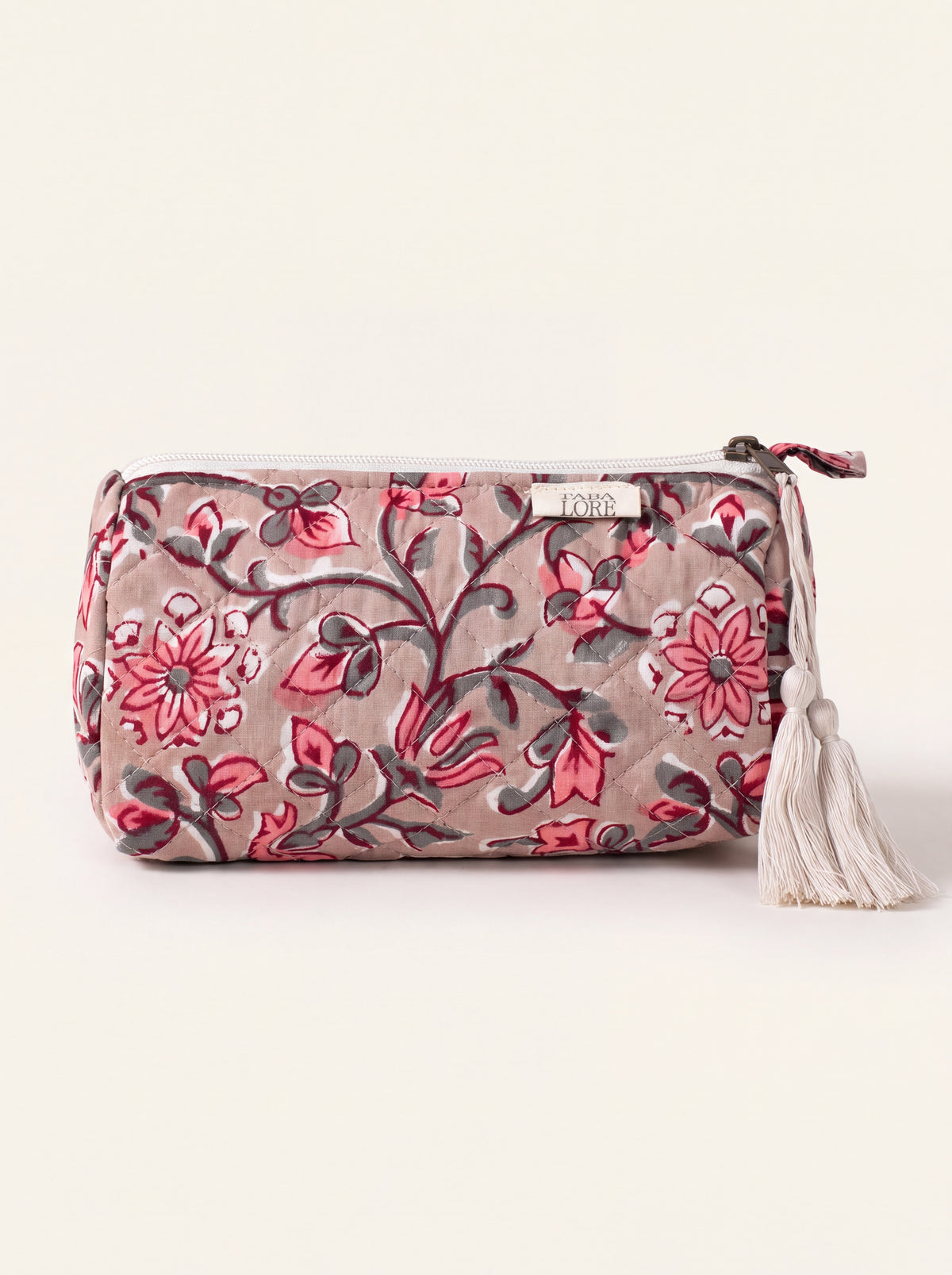 Small Fabalore Rosewood quilted floral pouch with cream zipper and tassels.