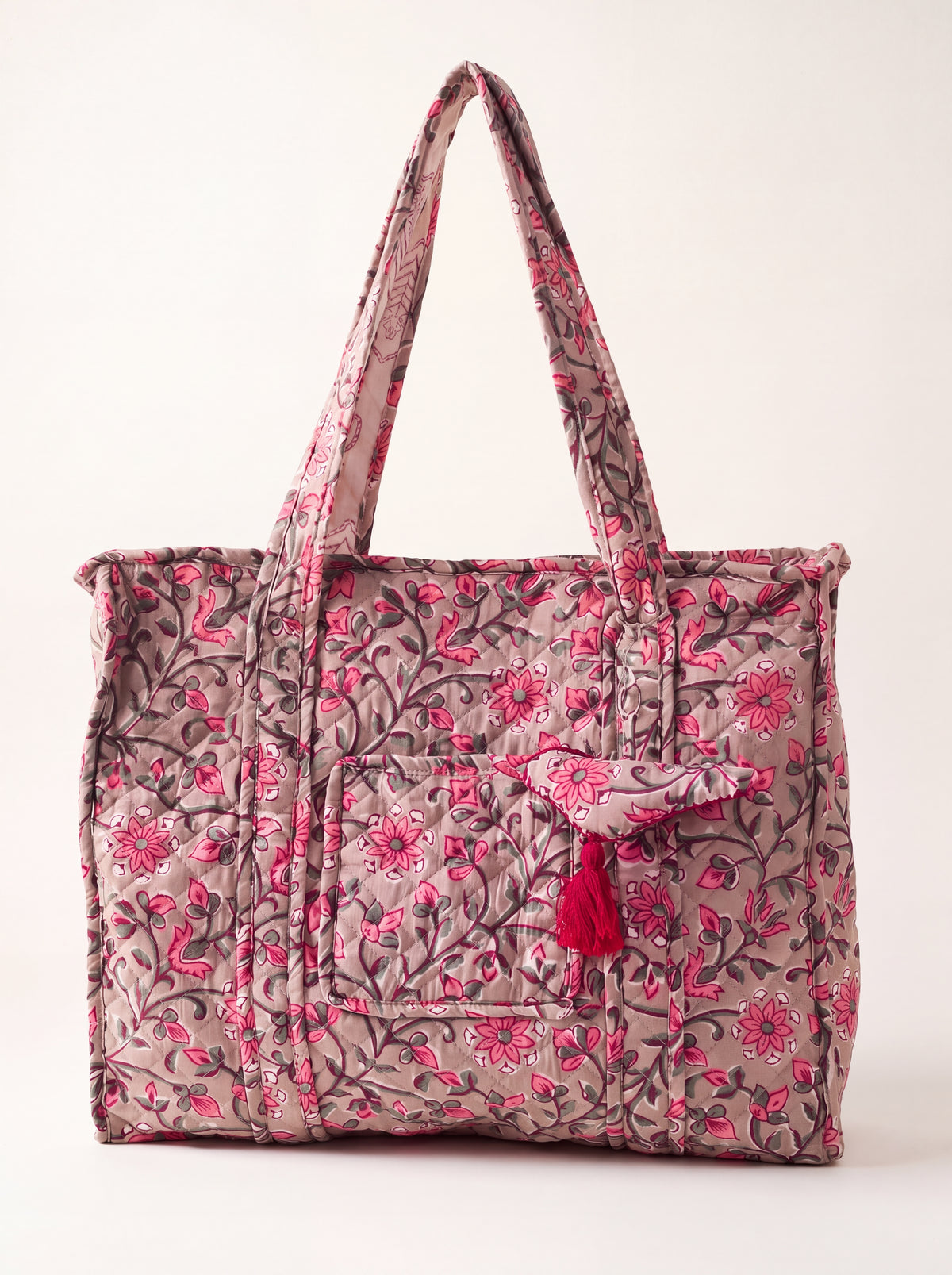Rosewood quilted cotton tote bag in taupe and pink floral print with front pocket and tassel charm
