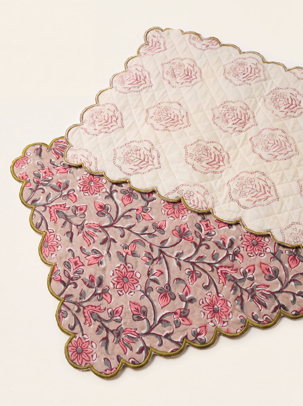 Reverse side of Rosewood quilted table runner with coordinating cream floral print and olive scalloped edge