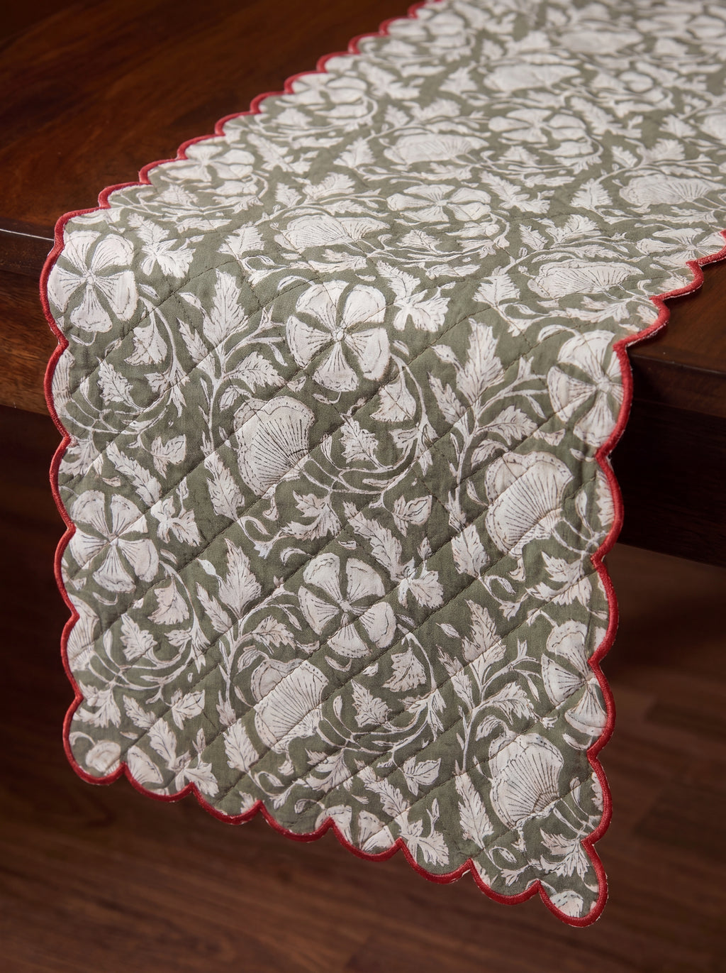 Woodland Vine botanical cotton table runner styled on a wooden dining table
